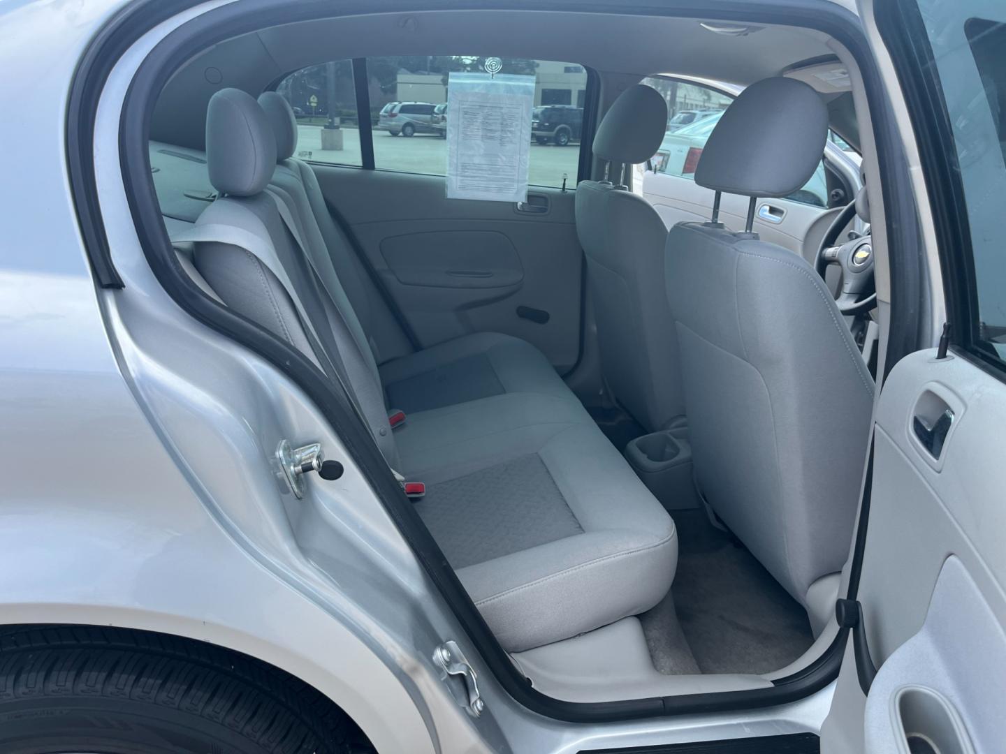 2009 SILVER /black Chevrolet Cobalt LS Sedan (1G1AS58H697) with an 2.2L L4 DOHC 16V engine, 4-Speed Automatic Overdrive transmission, located at 14700 Tomball Parkway 249, Houston, TX, 77086, (281) 444-2200, 29.928619, -95.504074 - Photo#12